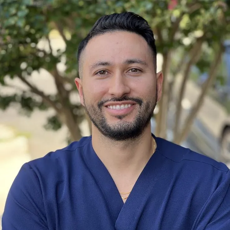 Portrait of Alex Pavidapha, MD